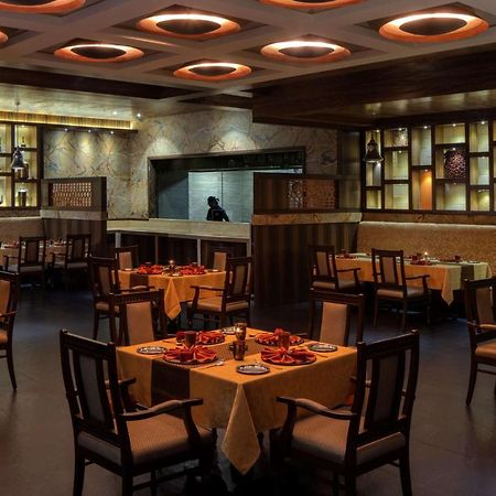 Radisson Blu Plaza Hotel Mysore Ngoại thất bức ảnh Interior of a restaurant in India