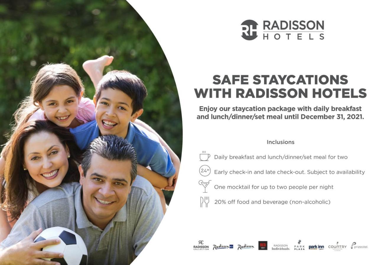Radisson Blu Plaza Hotel Mysore Ngoại thất bức ảnh A Radisson Hotels advertisement