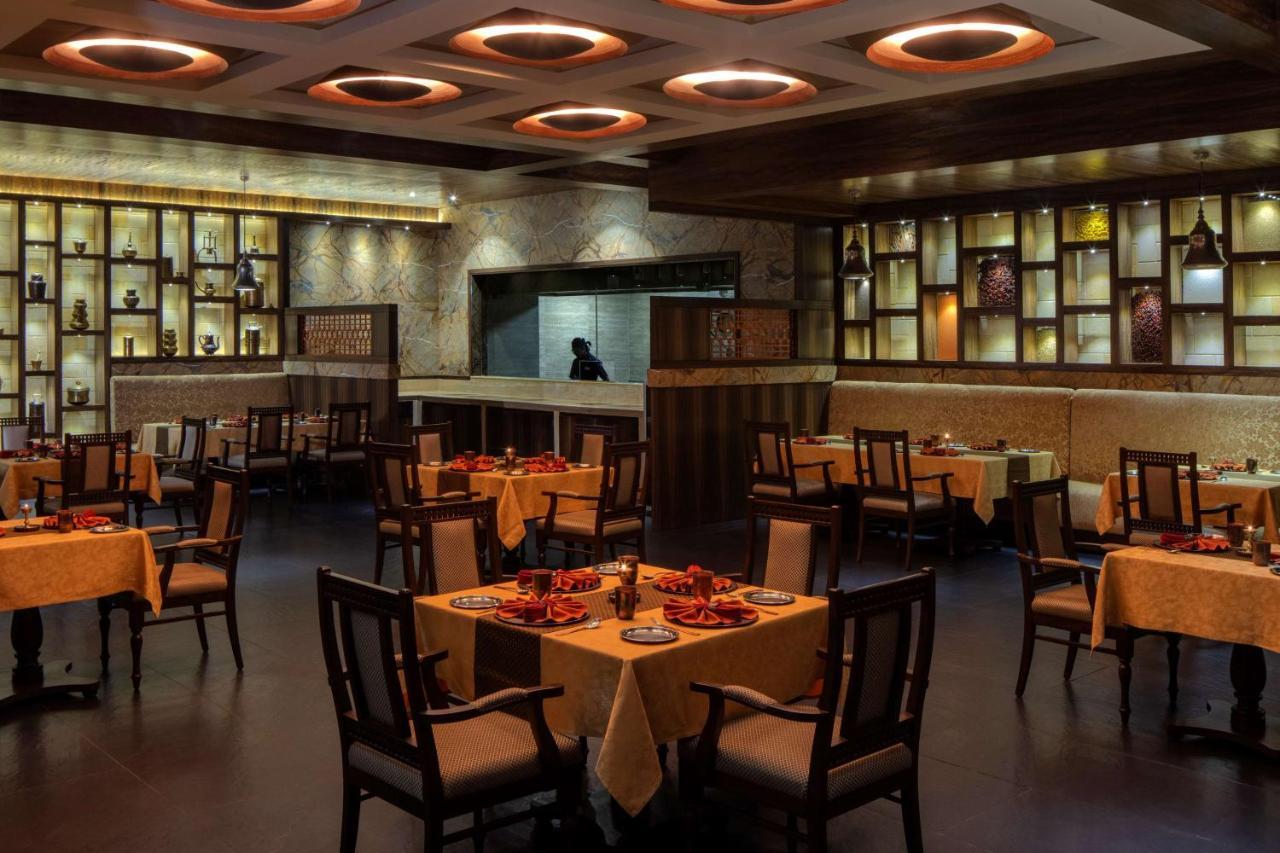 Radisson Blu Plaza Hotel Mysore Ngoại thất bức ảnh Interior of a restaurant in India