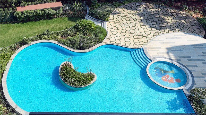 Radisson Blu Plaza Hotel Mysore Ngoại thất bức ảnh A swimming pool
